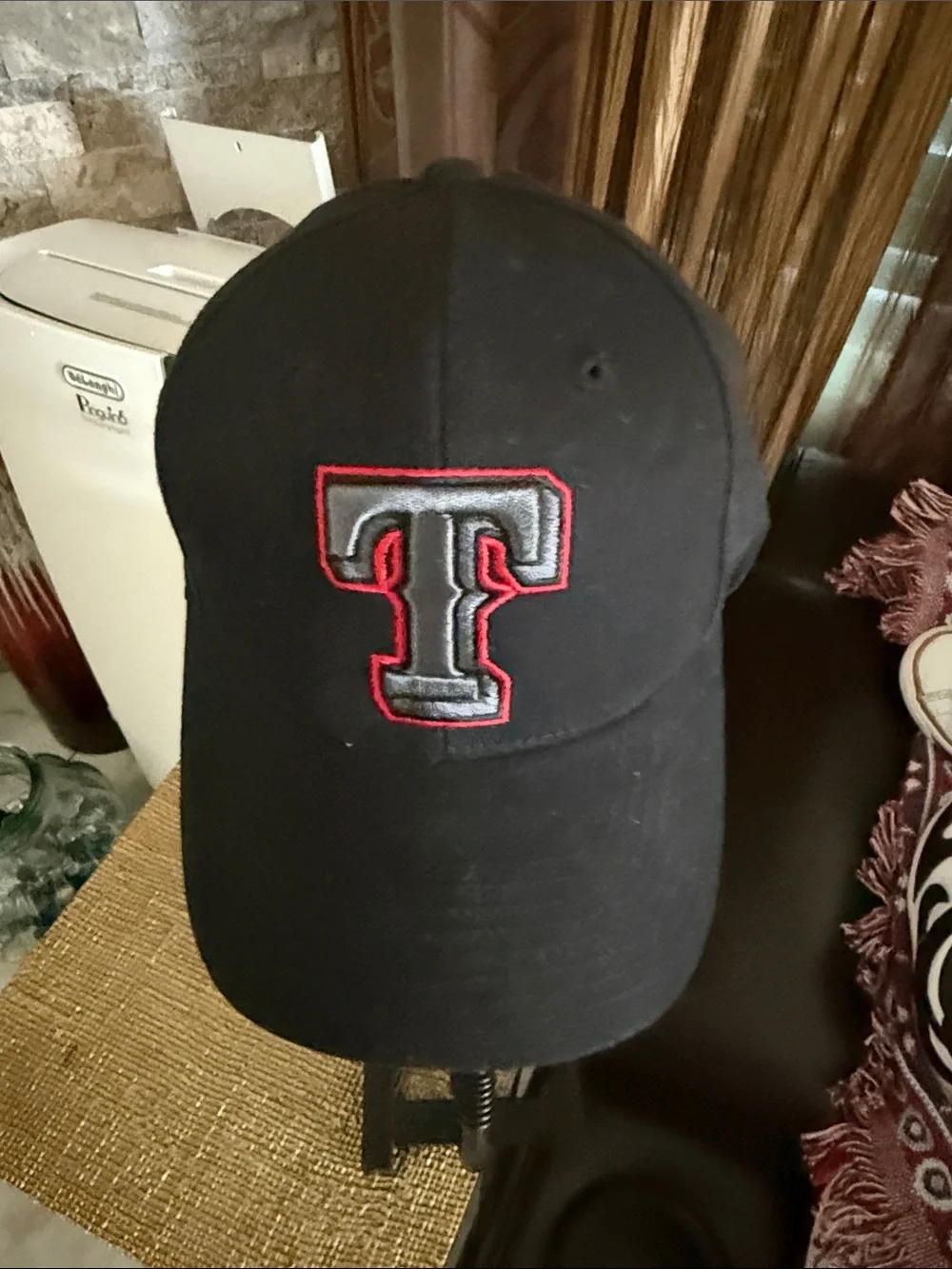 Black Baseball Cap with Embroidered 'T' Logo